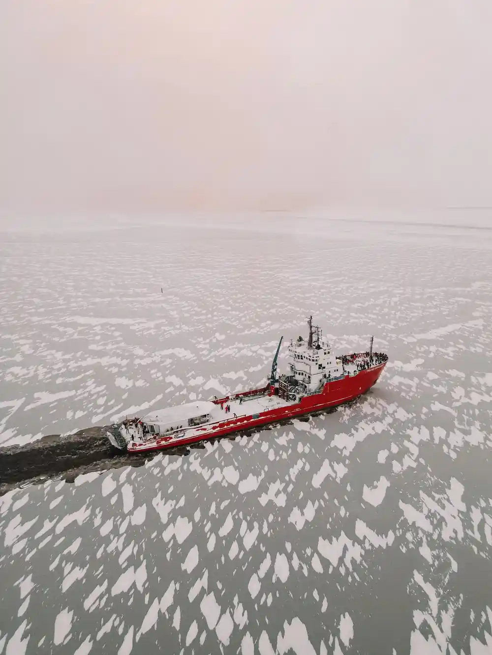 The icebreaker from high above working through scattered floes